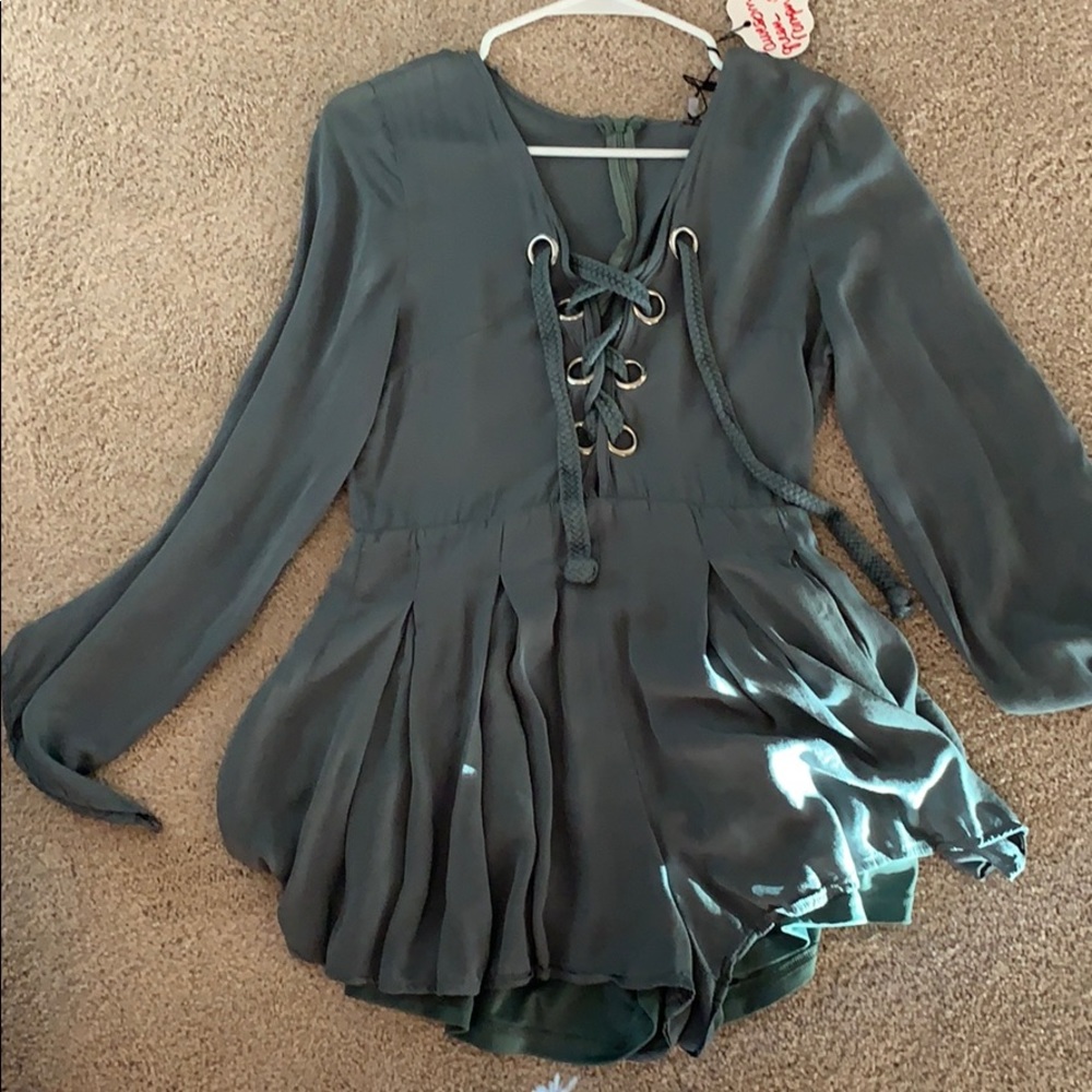 Green romper, a little worn, super comfy